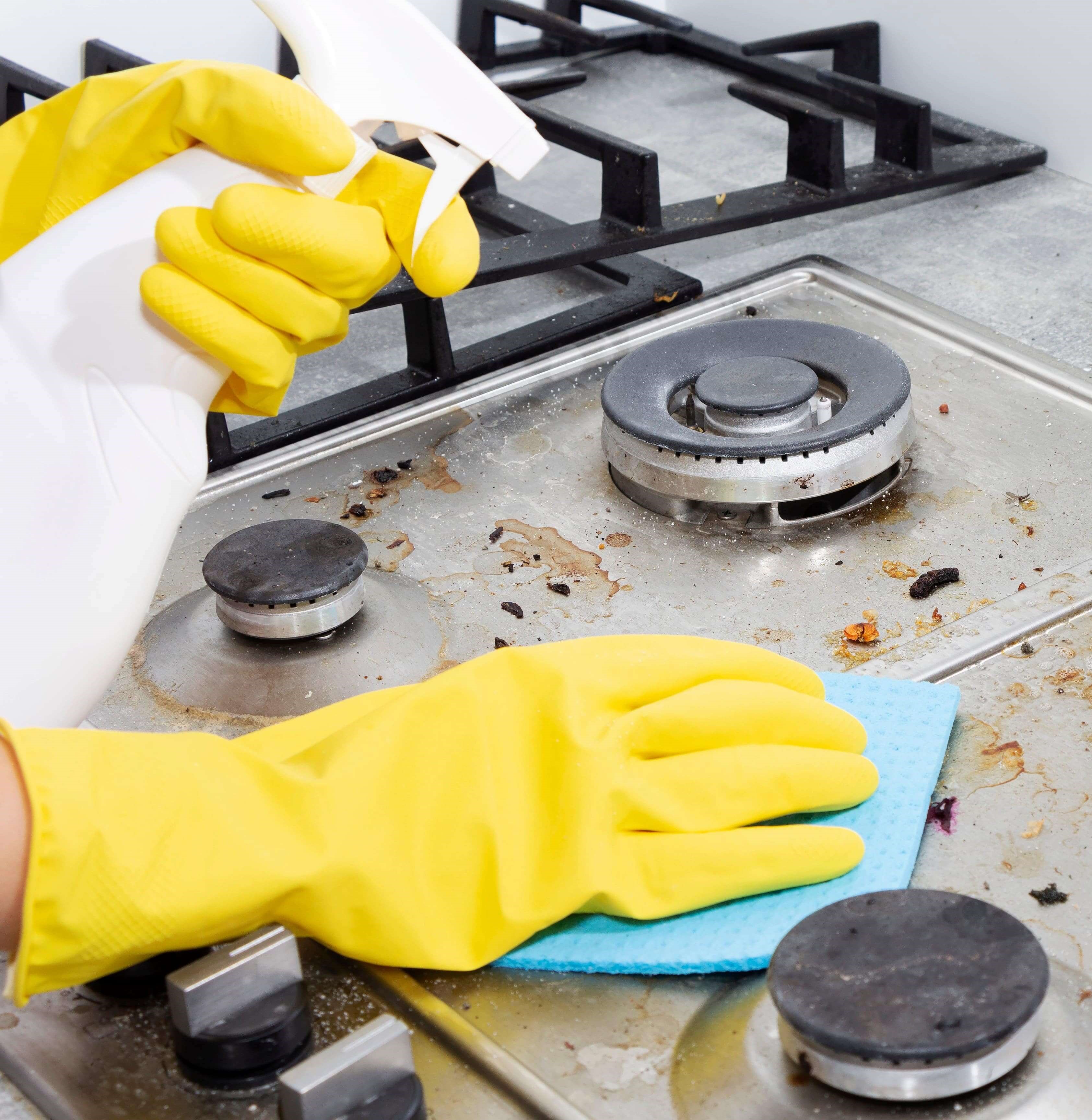 cleaning a dirty hob