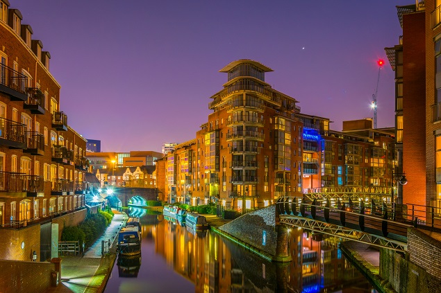 Photo of central Birmingham at night with sky and river in view