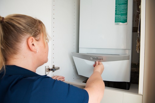 D&G engineer fixing a boiler