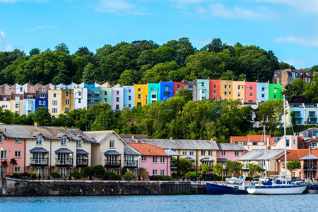 Picture of colourful houses in a row on the river