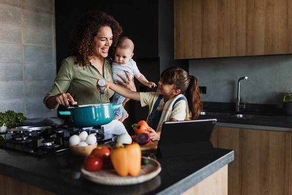 Family cooking in kitchen