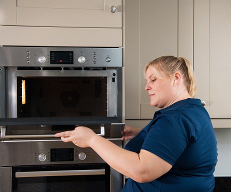 D&G engineer repairing an oven